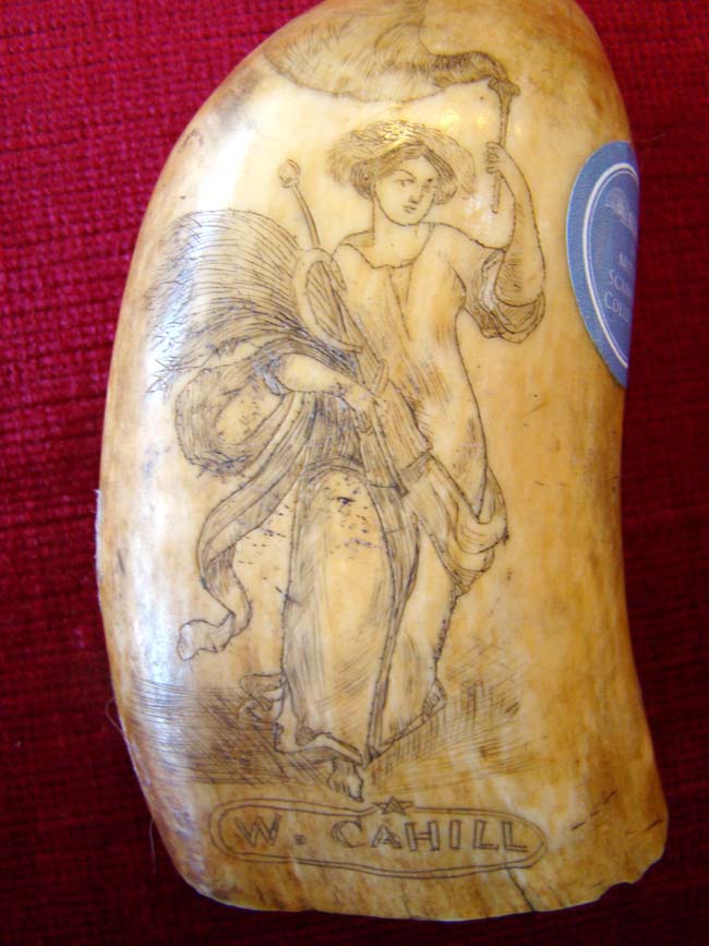 A 19th century Scrimshaw whale's tooth depicting a Frontiersman holding a Kentucky rifle circa 1858 — image 2